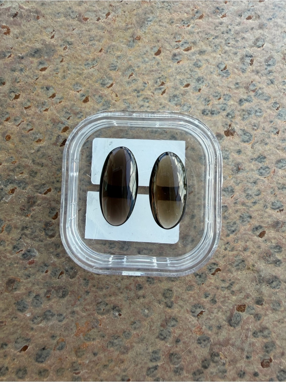 Smokey Topaz oval Cabachons 6.89 carats total weight